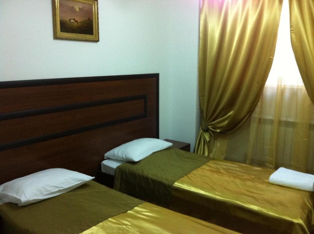 Bayterek Hotel Astana Bagian luar foto